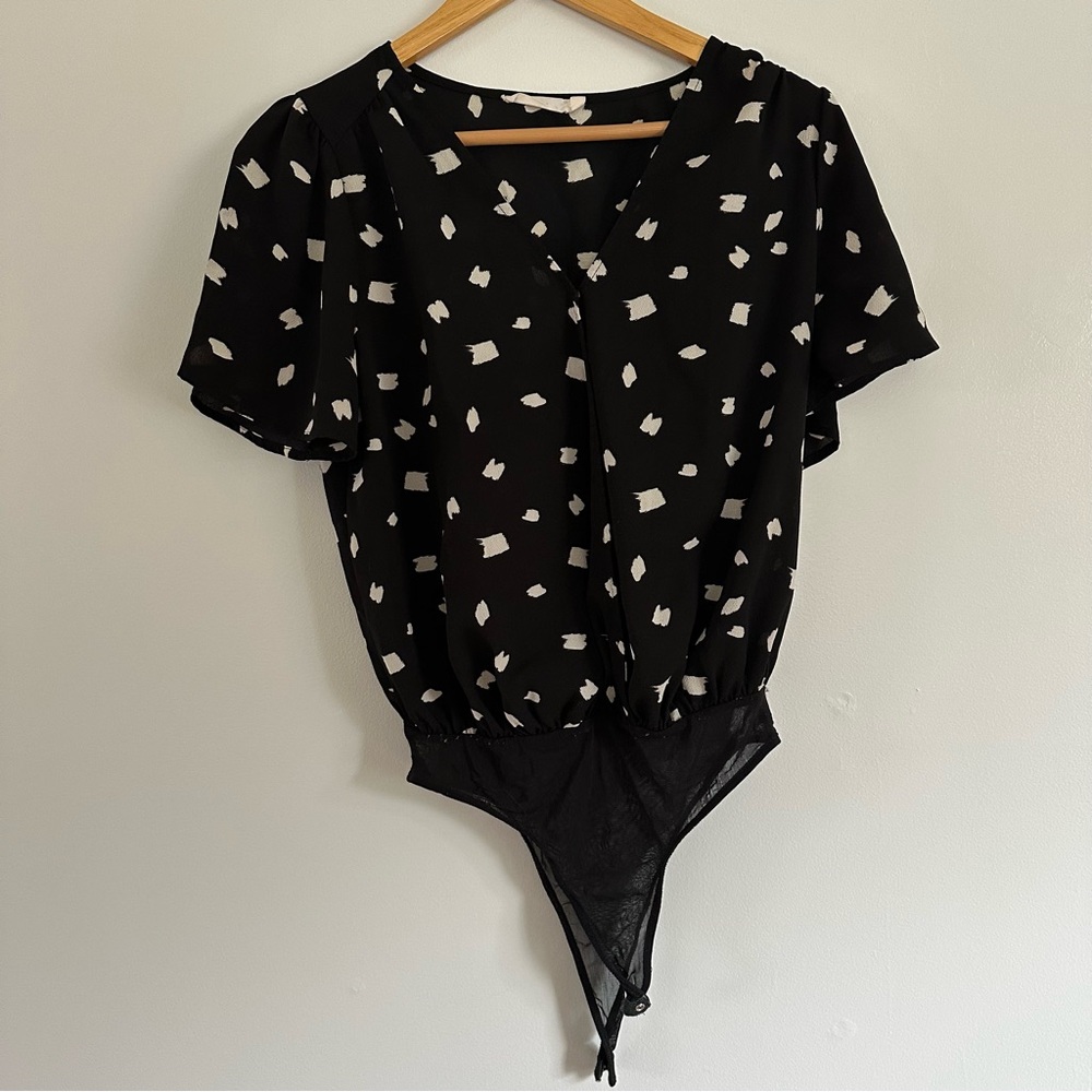 Lush black and white print bodysuit short sleeve blouse